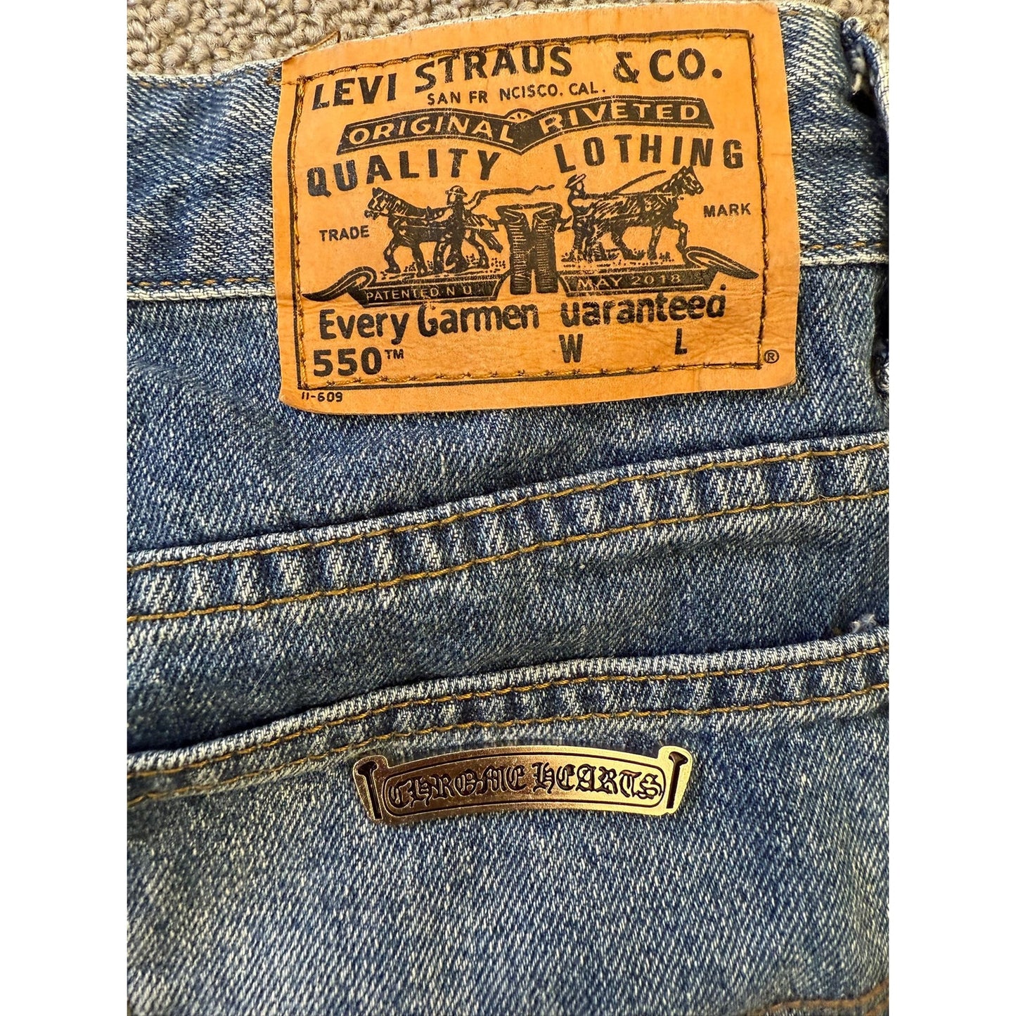 Levi's 550 Women's Chrome Hearts Cross Patch Light Wash Straight Jeans